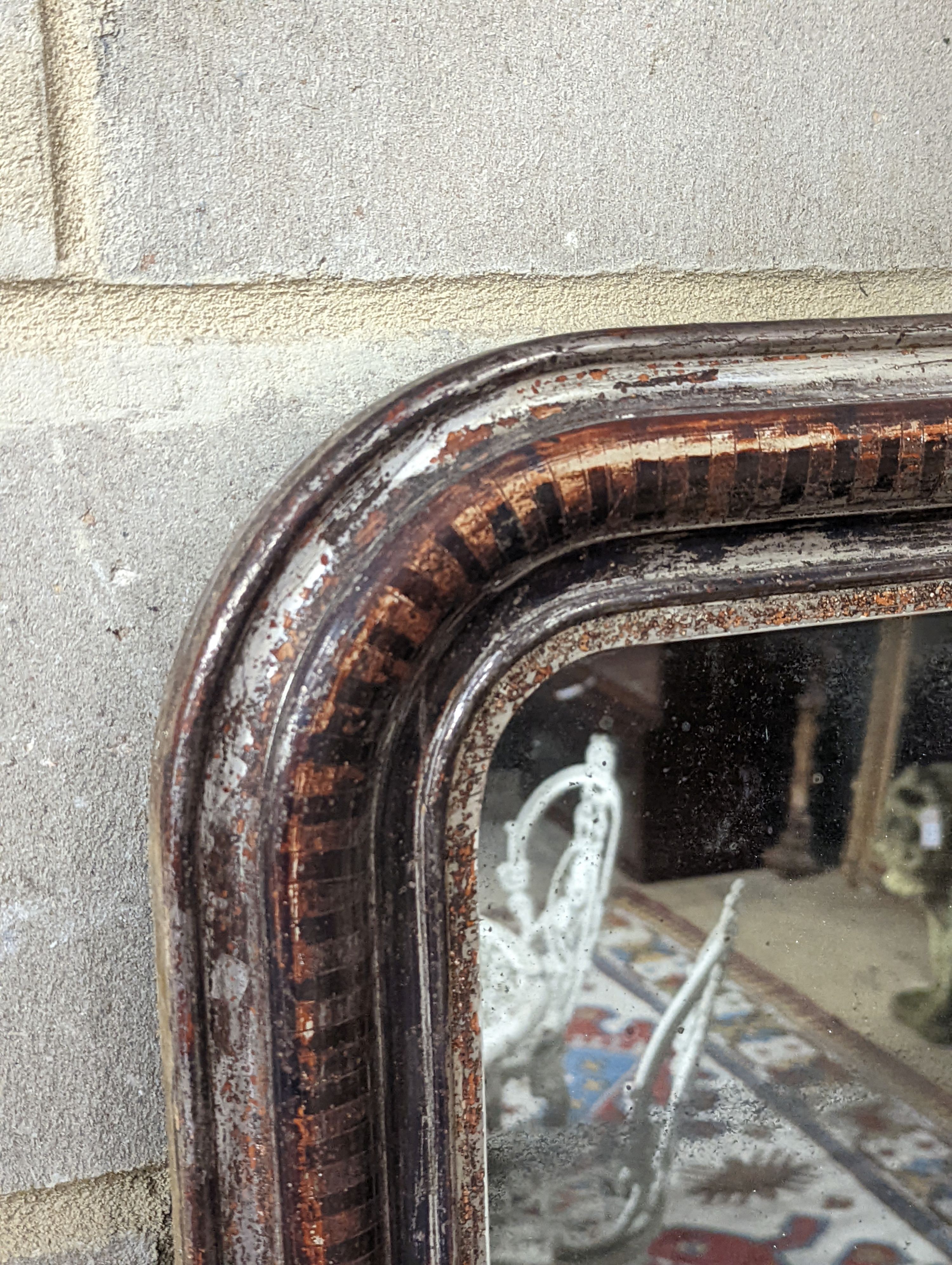 A 19th century French painted silvered wood wall mirror, width 54cm, height 70cm